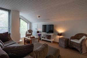 Posezení v ubytování Guest house Huize De Wit