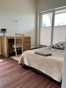 Postel nebo postele na pokoji v ubytování Apartament Diamentowy