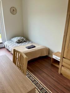 Postel nebo postele na pokoji v ubytování Apartament Diamentowy + 5 fotografií