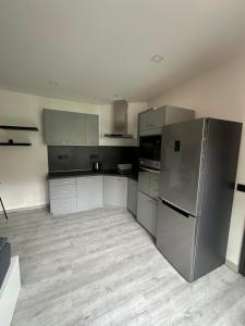 Una cocina o kitchenette en Penzion Fortuna Žatec