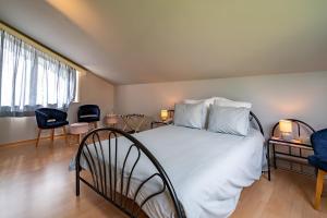 Postel nebo postele na pokoji v ubytování Guest house Huize De Wit