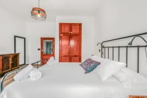 Ένα ή περισσότερα κρεβάτια σε δωμάτιο στο Agaete Modern Holiday Home