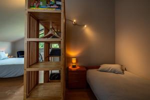 Postel nebo postele na pokoji v ubytování Guest house Huize De Wit