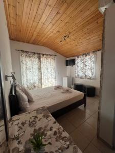 Postel nebo postele na pokoji v ubytování Ellas Hotel