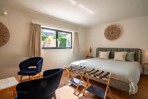 Postel nebo postele na pokoji v ubytování Guest house Huize De Wit