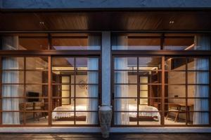 Una cama o camas en una habitación de Casa Sachi & Casa Halona