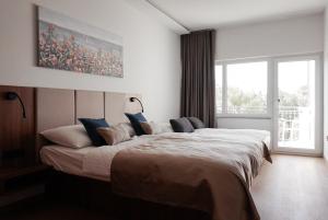 Postel nebo postele na pokoji v ubytování Hotel Stari Dvor