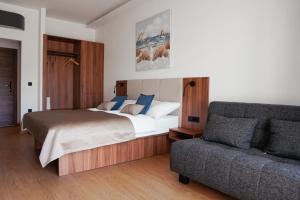 Postel nebo postele na pokoji v ubytování Hotel Stari Dvor