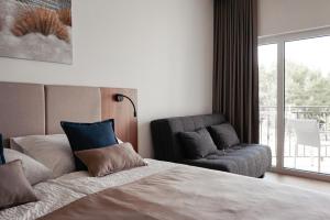 Postel nebo postele na pokoji v ubytování Hotel Stari Dvor