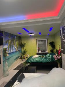 a bedroom with a bed and a swimming pool at Ferienwohnung SPA Delluxe 2 in Mülheim an der Ruhr