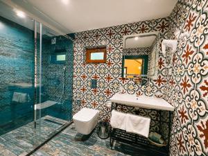 Koupelna v ubytování Runaway House - Talistan + 18 fotografií