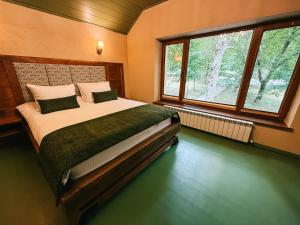 Postel nebo postele na pokoji v ubytování Runaway House - Talistan