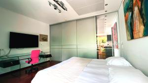 TV/trung tâm giải trí tại Domus Hotel