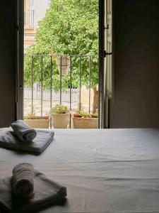 Posteľ alebo postele v izbe v ubytovaní Capricho de la Judería Suites