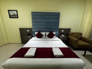 Letto o letti in una camera di ROYAL HOTEL
