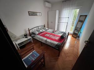 Postel nebo postele na pokoji v ubytování Apartments "Helios"