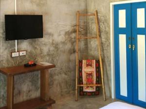 TV a/nebo společenská místnost v ubytování Namaste resort