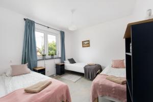 Ένα ή περισσότερα κρεβάτια σε δωμάτιο στο Yellow villa