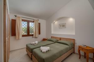 Ένα ή περισσότερα κρεβάτια σε δωμάτιο στο Campos Varios +20 φωτογραφίες