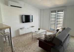 A television and/or entertainment centre at Apartamento Mirador del Tinto centro ciudad