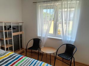 Postel nebo postele na pokoji v ubytování Rekreačný dom Railip