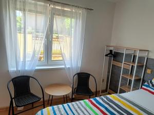 Postel nebo postele na pokoji v ubytování Rekreačný dom Railip
