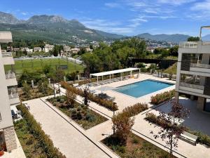 an aerial view of a house with a swimming pool at River side 18 in Herceg-Novi