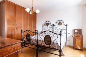 Ένα ή περισσότερα κρεβάτια σε δωμάτιο στο GuestHost - Casa Battazzi