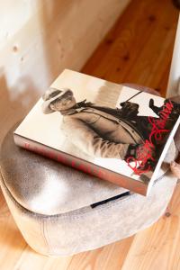 two books sitting on top of a table at FORTE GALGI in Gallio