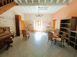 Posezení v ubytování Moulin de Sore - A louer en gîte ou chambres d'hôtes dans un lieu naturel préservé + 17 fotografií