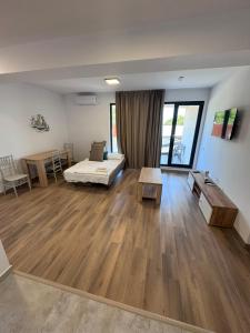 Ένα ή περισσότερα κρεβάτια σε δωμάτιο στο Cazare ieftin Techirghiol