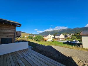 a view from the deck of a house at appartement le blanco neige in Puyvalador