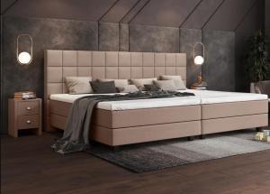 a bedroom with a large bed in a room at Haus 1 in Niederdorla