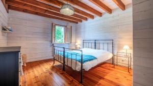 Postel nebo postele na pokoji v ubytování Moulin de Sore - A louer en gîte ou chambres d'hôtes dans un lieu naturel préservé