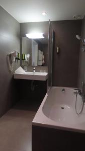 Koupelna v ubytování Hotel Adagio