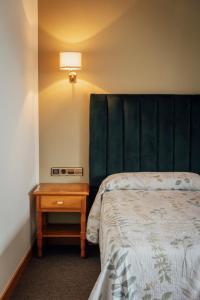 Postel nebo postele na pokoji v ubytování Hotel San Jorge