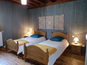 Postel nebo postele na pokoji v ubytování Moulin de Sore - A louer en gîte ou chambres d'hôtes dans un lieu naturel préservé