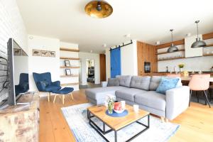 Posezení v ubytování Apartament Koniakowski - E12 Bukowa Góra