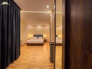 Ένα ή περισσότερα κρεβάτια σε δωμάτιο στο SOFiA PYRAMiDS & SPHiNX HOTEL free pool access +37 φωτογραφίες