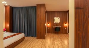 Ένα ή περισσότερα κρεβάτια σε δωμάτιο στο SOFiA PYRAMiDS & SPHiNX HOTEL free pool access