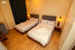 Ένα ή περισσότερα κρεβάτια σε δωμάτιο στο SOFiA PYRAMiDS & SPHiNX HOTEL free pool access
