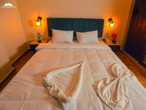 Ένα ή περισσότερα κρεβάτια σε δωμάτιο στο SOFiA PYRAMiDS & SPHiNX HOTEL free pool access