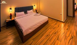 Ένα ή περισσότερα κρεβάτια σε δωμάτιο στο SOFiA PYRAMiDS & SPHiNX HOTEL free pool access