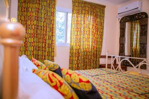 Postel nebo postele na pokoji v ubytování Leet Dorian HOTEL