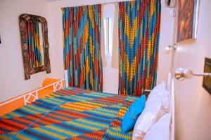 Postel nebo postele na pokoji v ubytování Leet Dorian HOTEL