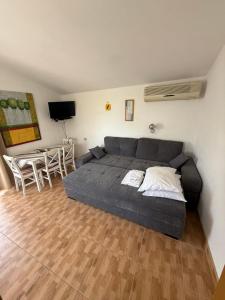 Postel nebo postele na pokoji v ubytování Apartments Jerković Drašnice-1bd