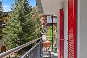 A balcony or terrace at Zermatt, 4 pers, 3 lits - Balcon avec vue et petit jardin