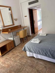 Postel nebo postele na pokoji v ubytování Flamingo Beach Hotel