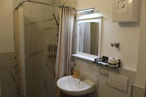 Koupelna v ubytování Hotel Garni Postkutsche