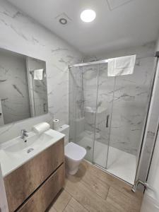 Kúpeľňa v ubytovaní SM Apartments + 6 fotografií